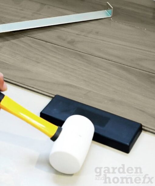 Laminate floor tapping bar